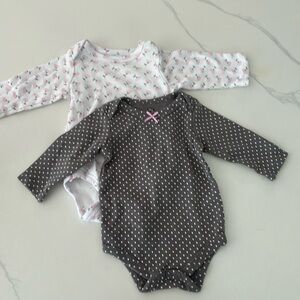 Size 0-3 gently used onesies